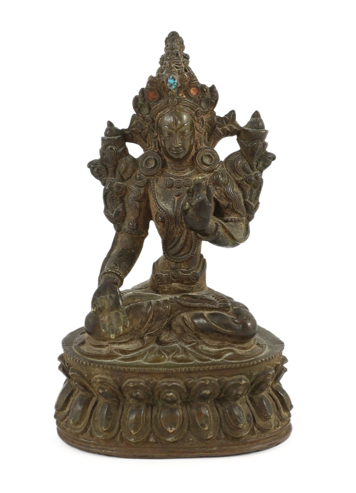 A Tibetan bronze seated figure of White Tara, 17th/18th century, 11 cm high